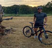 Wood enjoys riding bikes in his free time.